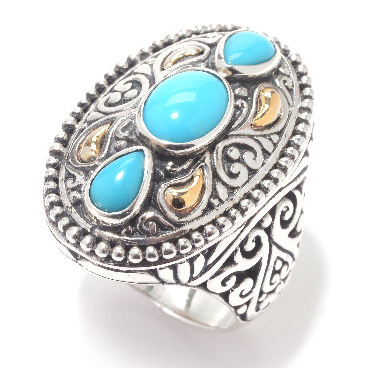 Samuel B Zenith Turquoise Ring. Our Sterling Silver 18k solid Gold scroll work north south sleeping beauty turquoise ring, handcrafted in Bali by our skilled artisans. From our signature collection, Royal Bali™ featuring designs handcrafted using sterling silver, solid 18k gold accents and genuine gemstones. Size 7.