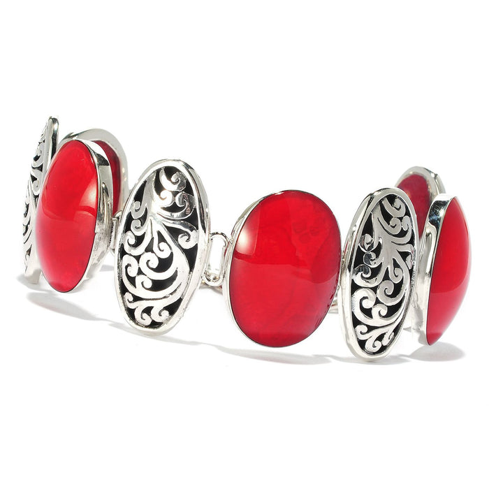 Samuel B. Sterling Silver Oval Coral and Balinese Design Bracelet with Toggle Clasp. Our Expression Sterling Silver coral oval link bracelet, handcrafted in Bali by our skilled artisans. The Gems of the Sea collection is inspired by the beauty of the white beaches, sparkling sea and the flourishing coral reefs of Bali.