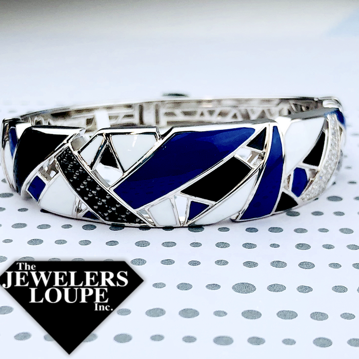 Gorgeous gradients of color inspire the imagination in the Spectrum Collection by Belle Etoile. Featuring hand-painted Italian enamel on pave-set sterling silver, Spectrum is a captivating chromatic display of enchanting hues.  Hand-painted blue, white, and black Italian enamel with white stones set into rhodium-plated, nickel allergy-free, 925 sterling silver.