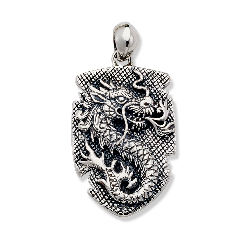Samuel B. Sterling Silver Dog Tag with Dragon Design Naga Api Pendant. Our Sterling Silver dog tag pendant with dragon design, handcrafted in Bali by our skilled artisans. Each creation in the Imperial Bali™ Men’s Collections draws its power from mystic dragons, yet bows in reverence to nature and ancient Balinese patterns, weaves and textures.