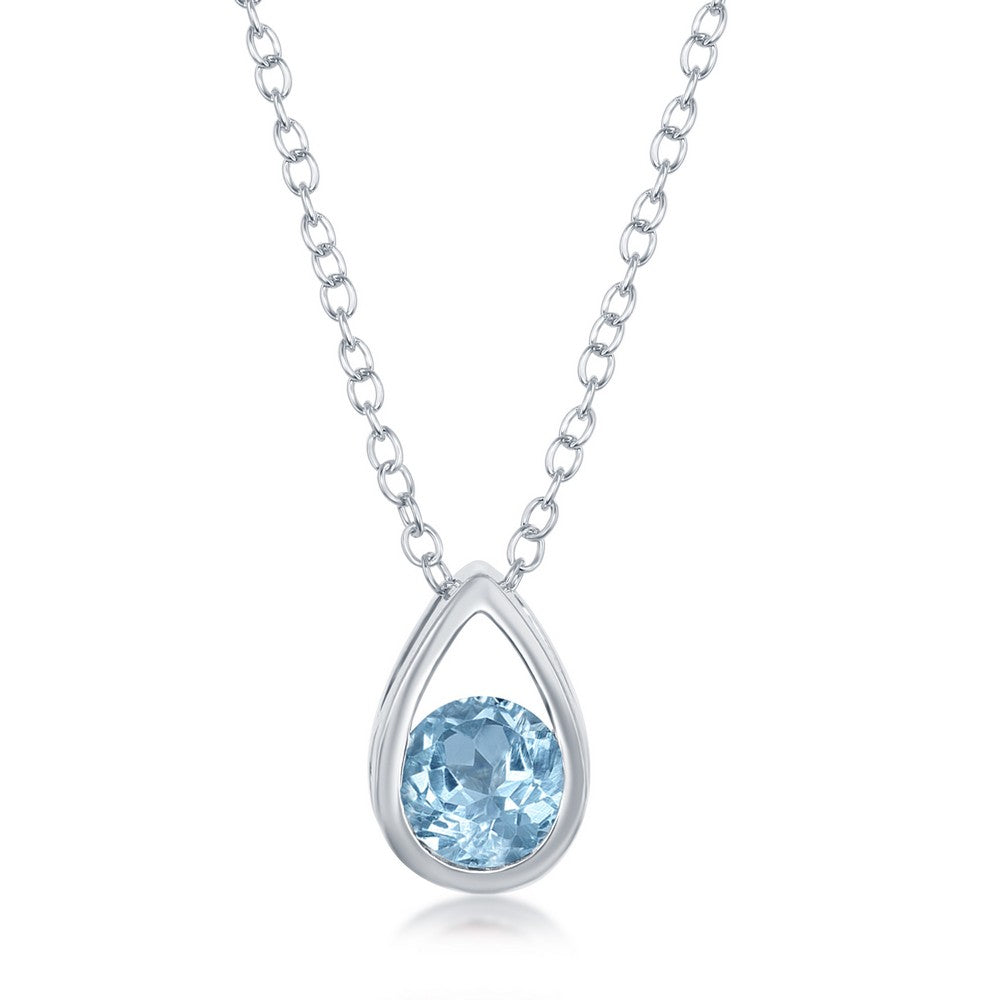 Sterling Silver Open Pear shaped Pendant with Round Blue Topaz on 16+2" Adjustable Sterling Silver Chain.