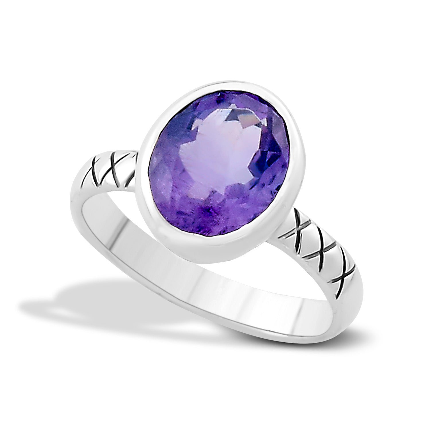 Samuel B. Sterling Silver Balinese Design Oval Salah Amethyst Ring, Size 7. Handcrafted in Bali by our skilled artisans. From our signature collection, Royal Bali™ featuring designs handcrafted using sterling silver, solid 18k gold accents and genuine gemstones. The February birthstone, Amethyst, is said to strengthen relationships and give its wearer courage. At one time, only royalty could wear the gem.