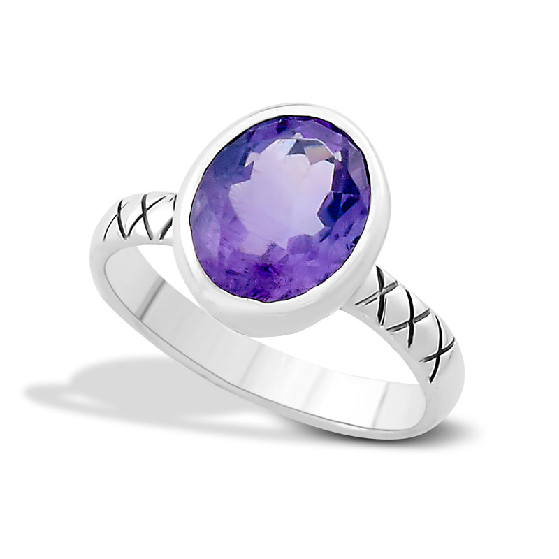 Samuel B. Sterling Silver Balinese Design Oval Salah Amethyst Ring, Size 7. Handcrafted in Bali by our skilled artisans. From our signature collection, Royal Bali™ featuring designs handcrafted using sterling silver, solid 18k gold accents and genuine gemstones. The February birthstone, Amethyst, is said to strengthen relationships and give its wearer courage. At one time, only royalty could wear the gem.