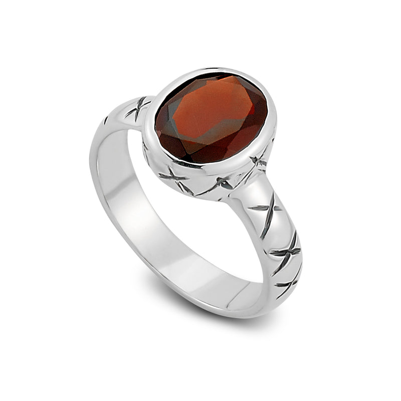 Samuel B. Sterling Silver Salah Ring with Oval Shape Garnet, Size 7. Our Sterling Silver oval shape garnet ring, handcrafted in Bali by our skilled artisans. From our signature collection, Royal Bali™ featuring designs handcrafted using sterling silver and genuine gemstones.