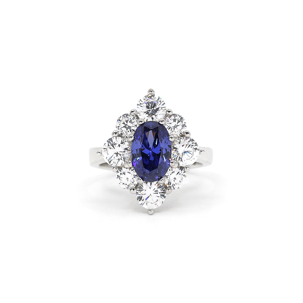 From the Victoria Collection by Anna Zuckerman, Elegant 1.5 carat sapphire blue crystalline oval in a halo of round diamond white round crystalline 5 tcw set in platinum plated sterling silver 925