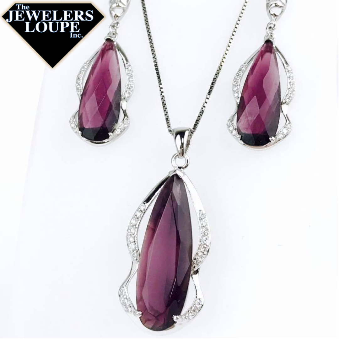 Sterling Silver Teardrop Created Amethyst Pendant with Cubic Zirconia Accents with 18" Sterling Silver Chain.