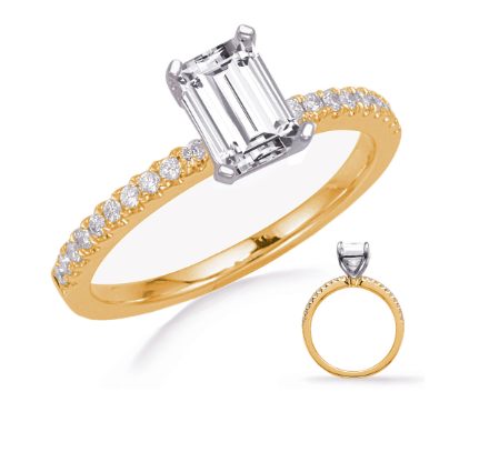 Gold ring with emerald-cut diamond and smaller diamonds on a white background