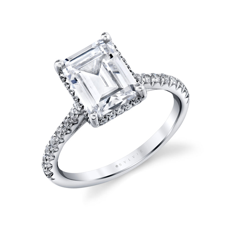 14K White Gold. Center Stone is a Emerald cut cubic zirconia 2.50CT 