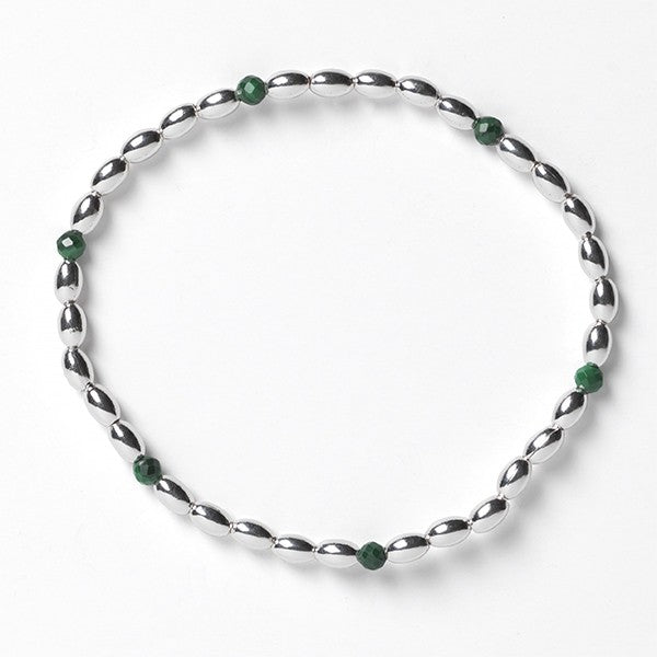 Southern Gates® 3mm Rice Bead Elastic Bracelet with Malachite Beads Elastic Bead Bracelets Available in: 6" and 7" 925 Sterling Silver Designed and distributed in Charleston, S