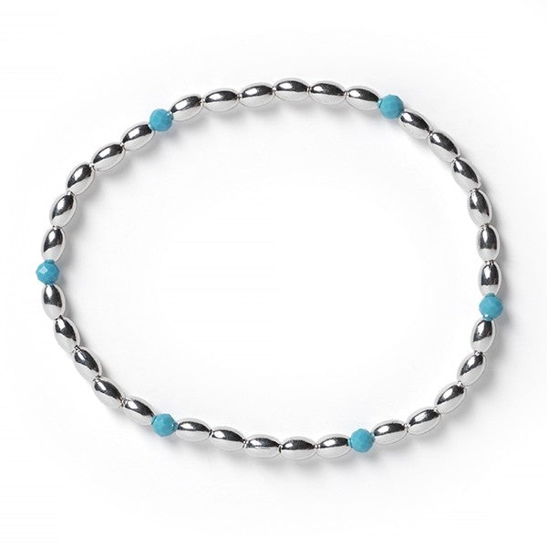 Southern Gates® 3mm Rice Bead Elastic Bracelet with Turquoise Magnesite Beads Elastic Bead Bracelets Available in: 6" and 7" 925 Sterling Silver Designed and distributed in Charleston, SC