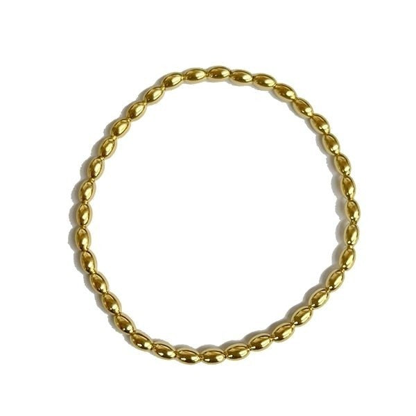 Southern Gates® 4mm Gold Plated Sterling Silver Rice Bead Elastic Bracelet Rice Beads.  6 inches. All Sunset Collection styles are Palladium over Sterling Silver with a 14K Hamilton finish. Designed and distributed in Charleston, SC Made in Italy