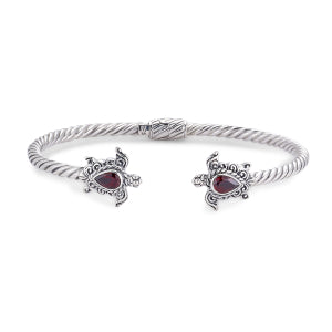 Samuel B. Sterling Silver Cable Style Hinged Bangle with Pear Shaped Garnet and Turtle Accents. Handcrafted in Bali by our skilled artisans. From our signature collection, Royal Bali™ featuring designs handcrafted using sterling silver and 18k yellow gold accents.