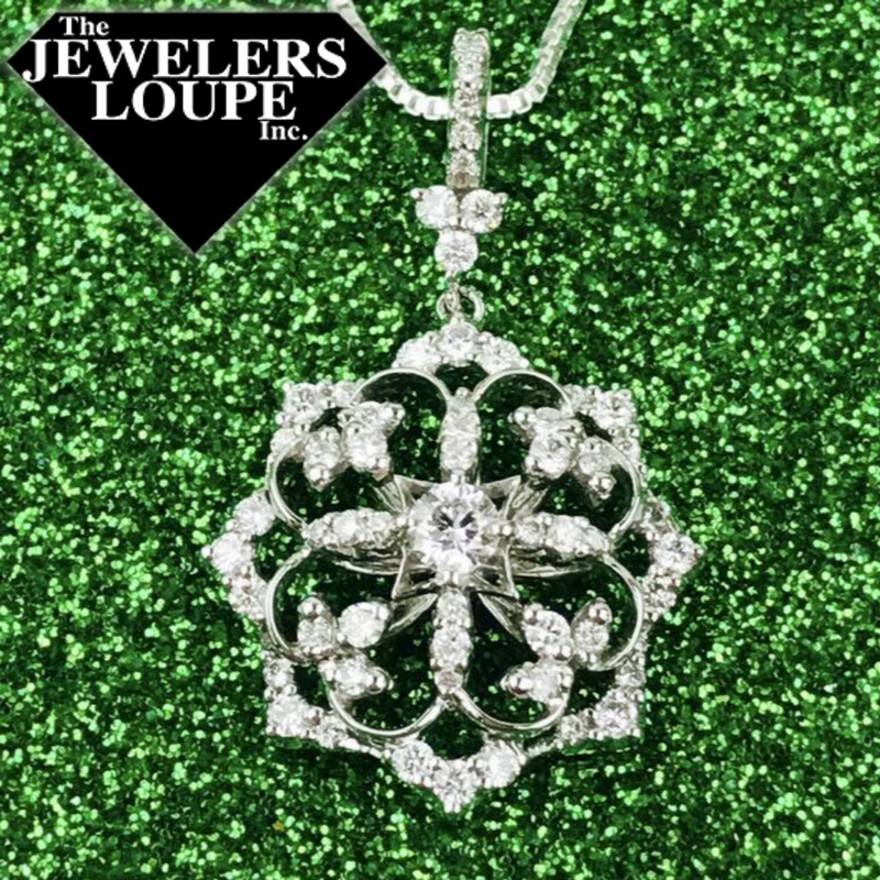 Elegant and Vintage Inspired 14K White Gold .60ctw Diamond Floral Filigree Pendant, approximately 1.25" from top to bottom. 