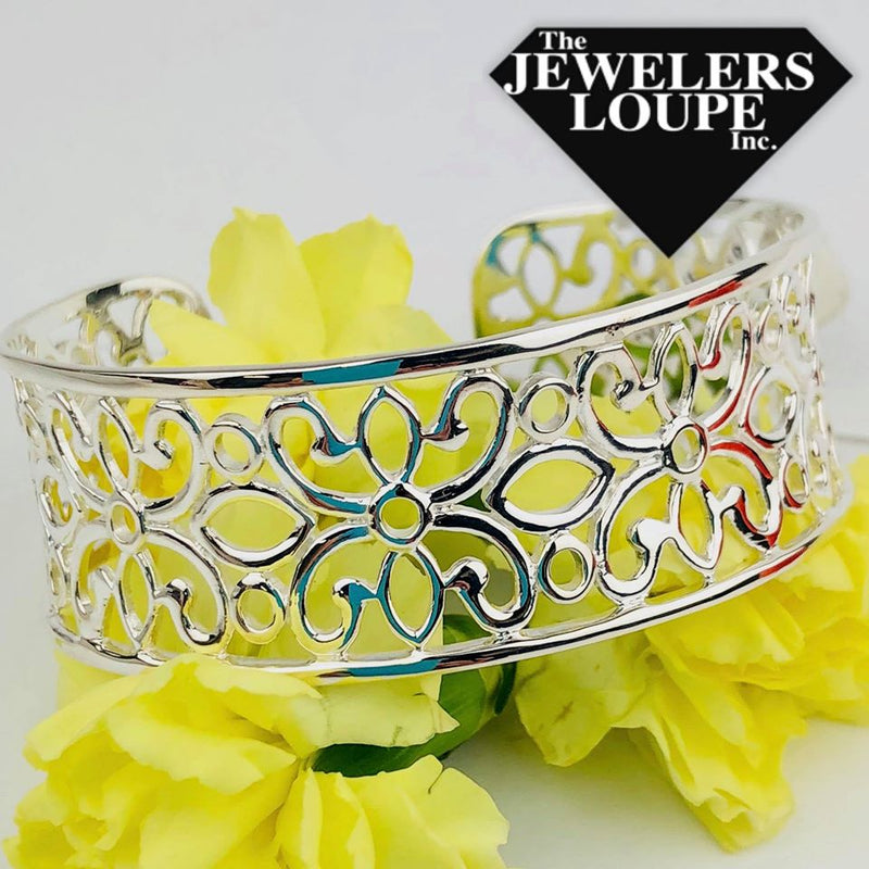 ﻿Southern Gates Courtyard Flower Scroll Cuff Bracelet Courtyard Series 7.5" 24mm Wide 925 Sterling Silver Designed in Charleston, SC  Celebrate historic Southern gardens featuring wrought iron elements of sweet blooms, scrolling vines and lush landscapes.