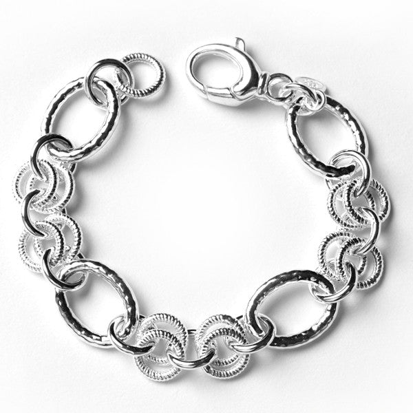 Southern Gates Multi-Link Bracelet  7.5" 925 Sterling Silver  Alternating hammered ovals and ribbed circles.