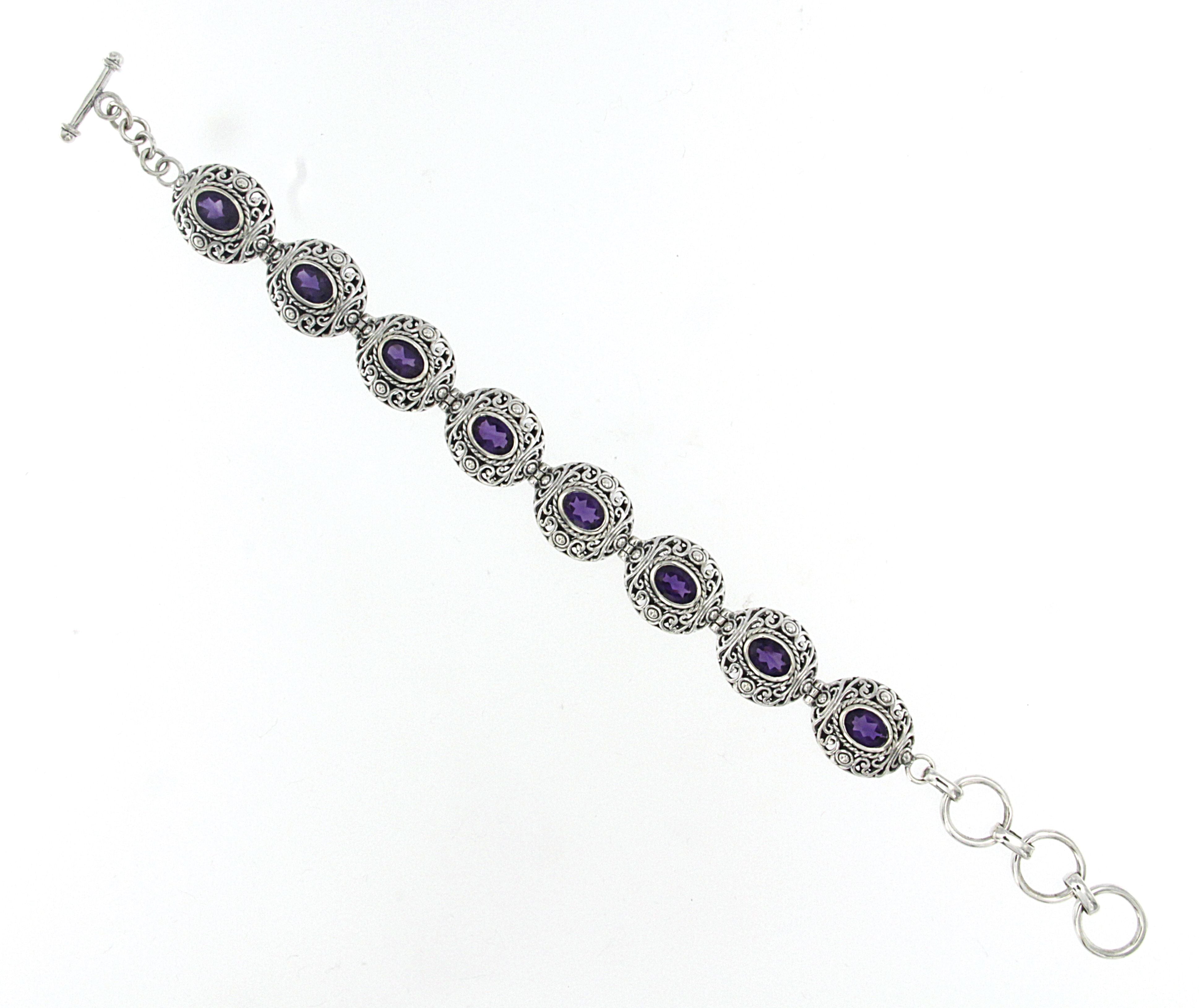 Samuel B. Sterling Silver Balinese Design Amethyst Bracelet, 6.5" with 1" extender. Our Sterling Silver amethyst station bracelet, handcrafted in Bali by our skilled artisans. From our signature collection, Royal Bali™ featuring designs handcrafted using sterling silver  and genuine gemstones. The February birthstone, Amethyst, is said to strengthen relationships and give its wearer courage. At one time, only royalty could wear the gem.