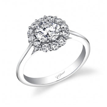 This magnificent 14K White Gold ring by Coast Diamonds features a radiant halo of .40ctw round diamonds which surrounds the center stone. Standard size created for a 1 ct center stone.