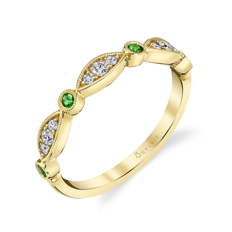 This vintage inspired milgrain edged 14K white gold stackable wedding band features alternating marquis and round shapes with 0.22 carats of alternating emerald gemstones and round brilliant diamonds. Pair with our other stackable bands for a chic trendy look.