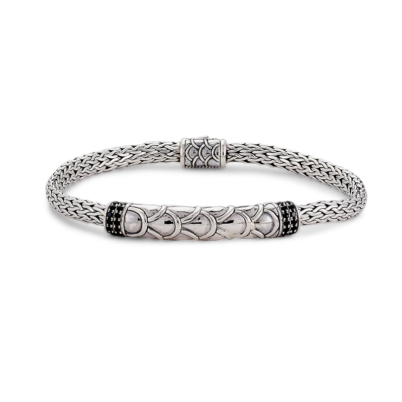 Samuel B. Sterling Silver Tulang Naga Baris Bracelet with Black Spinel. Our Sterling Silver 5mm tulang naga bar bracelet with pave black spinel, handcrafted in Bali by our skilled artisans. From our signature collection, Royal Bali™ featuring designs handcrafted using sterling silver, solid 18k gold accents and genuine gemstones.