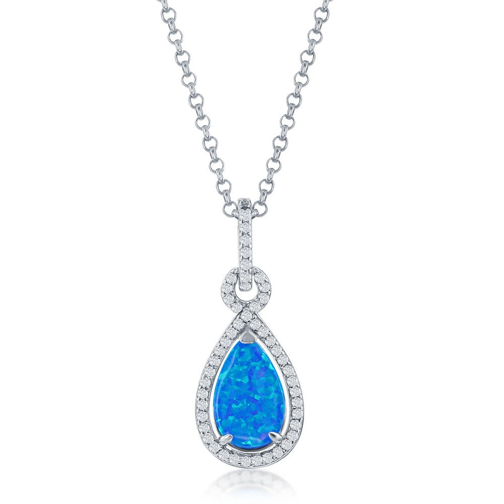 Sterling Silver Pear Shaped Created Blue Opal with Cubic Zirconia Halo Pendant on 18" Sterling Silver Chain.