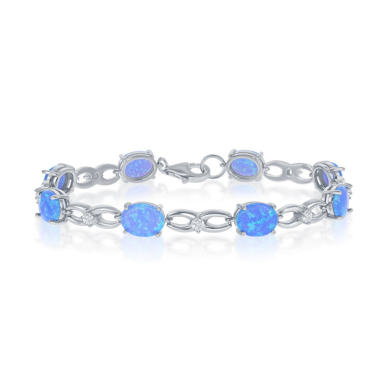 Sterling Silver Infinity Symbol and Oval Created Blue Inlay Opal Bracelet, 7.25".