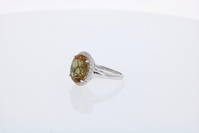 Lab Created Oval Color Change Lusterine and White Topaz Ring
