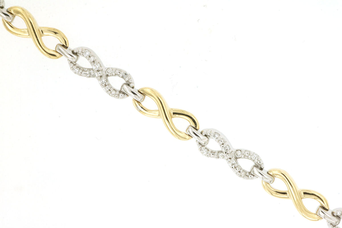 14K Yellow and White Gold Bracelet .26ctw Diamond Bracelet with alternating infinity symbol links. 7.5"