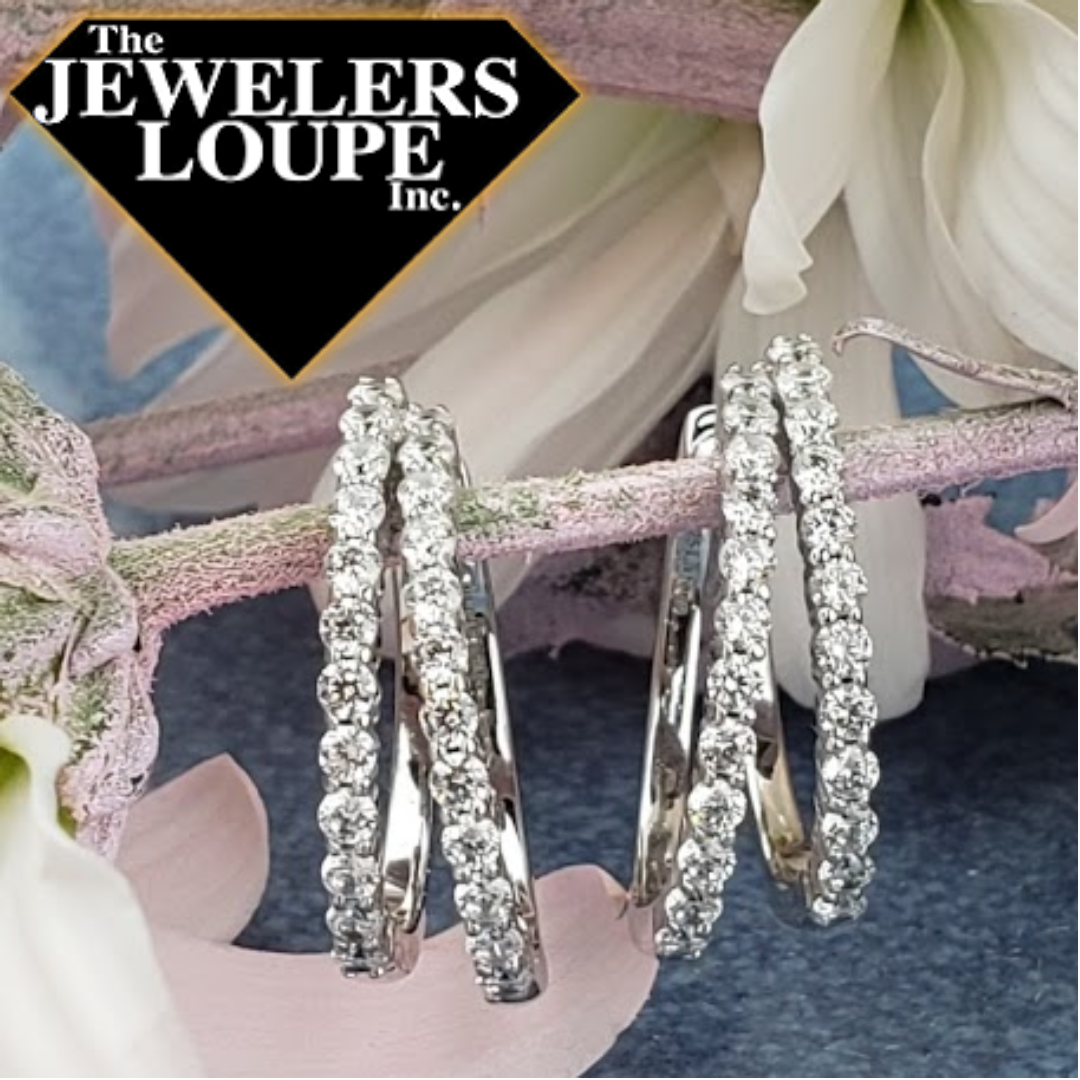 Fun and elegant. These oval-shaped double-hoop earrings are set with 1.44ctw Lafonn's signature Lassaire simulated diamonds in sterling silver bonded with platinum.